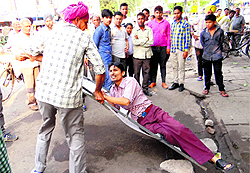 BMC staff remove encroachments near Gole Biggi in Bathinda on Wednesday