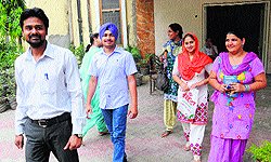Students of MA Public Administration (Part-I) walk out of the examination centre at Government Rajindra College in Bathinda on Wednesday