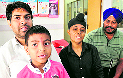 Thalassaemic patients Sanchit Garg (in pink) and Jasmeet Singh (in black) during a function at the Rotary Blood Society, Sector 37, in Chandigarh on Wednesday
