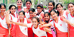 The basketball team of Strawberry Fields World School in a jubilant mood after winning the Inter-School Basketball Tournament for Girls (U-14) in Chandigarh on Wednesday