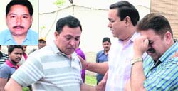 Aggrieved family members of the deceased industrialist Chander Mohan Arora (inset) at the spot where he committed suicide in Jalandhar on Wednesday. Tribune Photo: Malkiat Singh