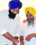 Revenue Minister Bikram Majithia performs sewa at Takht Damdama Sahib in Talwandi Sabo on Tuesday. A tribune File photograph