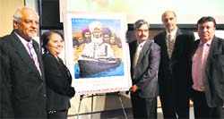 Canada Post CEO Deepak Chopra (right) releases the stamp on Komagata Maru in Jalandhar on Wednesday. Tribune photo