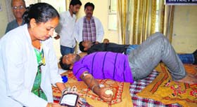 People donate blood at a camp organised by the Red Cross Society in Amritsar on Thursday.