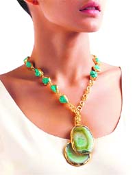 A designer saree or a neckpiece can be a perfect Mothers Day gift.