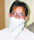 Sandeep Khurmi, the main accused, in police custody in Mohali on Thursday.
