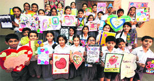 Students display Mothers Day cards made by them during a competition at Manav Mangal High School in Chandigarh on Thursday.