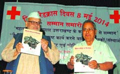 Governor Aziz Qureshi at the Red Cross Day function to honour volunteers at the Raj Bhavan in Dehradun on Thursday. A Tribune photograph