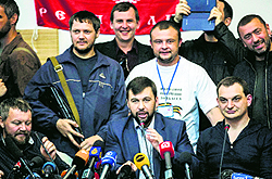 Head of the election commission of the so-called Donetsk People's Republic, Denis Pushilin (centre foreground), at a press conference in Donetsk on Thursday