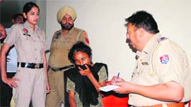 The police question the woman who allegedly tried to commit suicide at SR Government College for Girls in Amritsar on Friday.