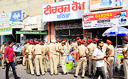 Police personnel outside the Teachers Home in Bathinda on Friday