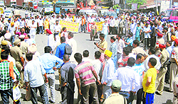 Khanpur villagers block the National Highway in Hoshiarpur on Friday