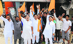 Members of Hindu Shiv Sena protest against a wine shop near Patiala Fatak in Bathinda on Saturday