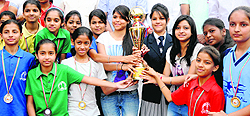Table soccer girls team of the city in a jubilant mood after winning the tournament at Sector 7 in Chandigarh on Saturday