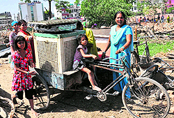 Rukhsana and her daughters shift their belongings after the demolition of their dwelling in Mazdoor Colony, Sector 52, Chandigarh, on Saturday