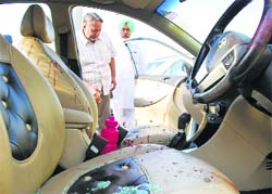 The blood-stained car of Vaneet Mahajan, one of the complainants who was attacked by unidentified assailants, in Amritsar.