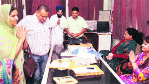Vaani Venkataratnam, wife of the Divisional Commissioner (second from right), at a meeting with parents of special children at Prayaas School in Jalandhar on Saturday.