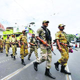 CISF jawans conduct a flag march in Kolkata on Saturday ahead of Lok Sabha polls.