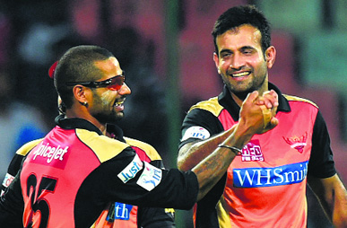 Sunrisers Hyderabad players Shikhar Dhawan and Irfan Pathan celebrate the wicket of JP Duminy. Hyderabad won by 8 wickets (D/L method).