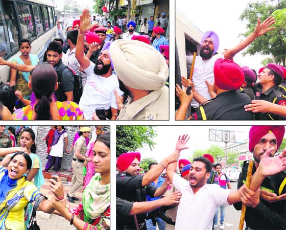Members of various teachers unions being taken into custody during their protest outside Teachers Home in Bathinda on Sunday