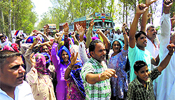 Dhanauri villagrs protest in front of the Garhi police station in Jind on Sunday