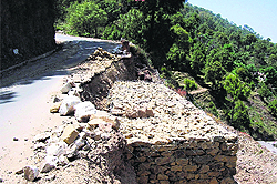 The Dharampur-Sanawar road stretch which caved in. The PWD is yet to repair it