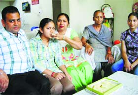 Daisy Garg celebrates success with her parents in Sangrur on Sunday