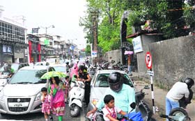 Vehicles parked outside St Joseph Academy in Dehradun on Monday