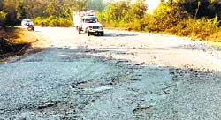 A stretch of the Pathankot-Mandi national highway full of potholes. Photo by writer