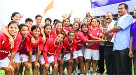 The Manipur team poses with the trophy after the win over Orissa in the Womens Football National Championship on Monday.