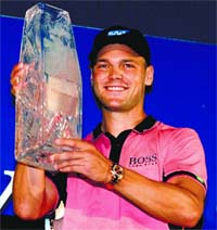 Martin Kaymer celebrates with the winners trophy after his one-stroke victory at the Players Championship in Ponte Vedra Beach, Florida, on Sunday.