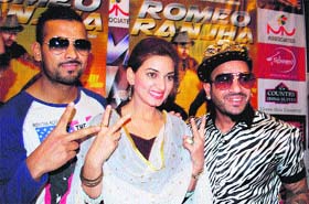 Garry Sandhu (left), Parul Gulati (centre) and Jazzy B, the star cast of the upcoming Punjabi movie, "Romeo Ranjha", at a press conference in Amritsar.