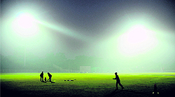 Players practise under floodlights at the cricket stadium in Sector 16, Chandigarh