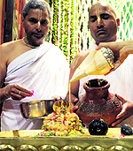 Devotees take part in Maha Abhisheka of Lord Narsimha at the ISKCON temple in Sector 36, Chandigarh, on Tuesday