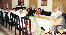 Governor Dr Aziz Qureshi chairs a meeting at Raj Bhavan in Dehradun on Tuesday.