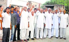 Enthusiastic residents of Dalbir Suhags native village, Bisaan, in Jhajjar