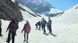 Students from Maharashtra during their visit to snow-covered Gauri Kund.