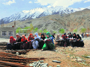 Students take classes in the open as Government Degree College in Kargil lacks sufficient classrooms.