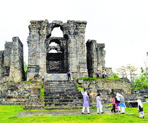 Schoolchildren on a visit to the Mratand Sun Temple in Anantnag district on Tuesday.
