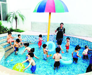 Tiny tots have a gala time during a pool party at Penguin Castle Preschool in Ludhiana.