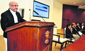 Justice Hemant Gupta, Judge, Punjab and Haryana High Court, and chairman, e-Governance and Computer Committee, launches new information technology facilities at the High Court auditorium in Chandigarh on Wednesday