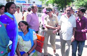 The victims father (second from right) and mother (sitting) at the GMSH, Sector 16, Chandigarh, on Wednesday