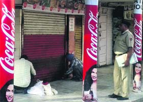 Estate office officials seal an eating joint in Sector 22, Chandigarh, on Wednesday
