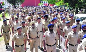 Police personnel gather for a rehearsal at Government Polytechnic College in Sector 26, Chandigarh, on Wednesday