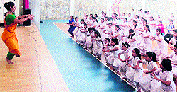 Nidhi Mishra, a Bharatnatyam exponent, takes a dance workshop of students of Ecole Globale School in Dehradun on Wednesday