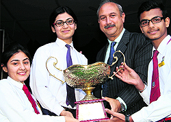 Students being awarded at the annual prize distribution function of Carman School in Dehradun on Wednesday