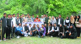 Students pose for a photograph during eco-tour to Shankracharya