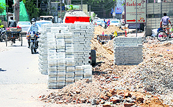 Road where inter-locking tiles are being laid