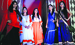 Students sport traditional dresses designed by them at De Samar Academy in Ludhiana on Wednesday