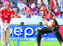 Kings XI wicket-keeper Wriddhiman Saha, who hammered a lightning half-century to earn the Man of the Match award, looks on as Hyderabad Sunrisers opener Aaron Finch is clean bowled. Saha, along with Manan Vohra, gave Kings XI a blistering start to make a mockery of the mammoth 206-run target. PTI